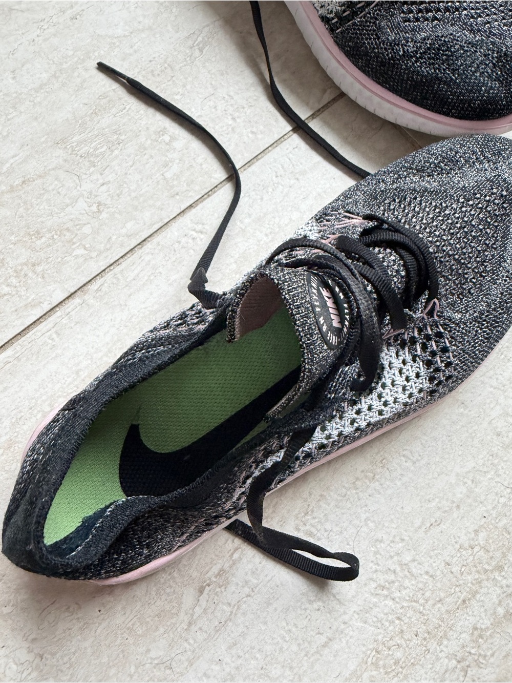 Nike Women's Flyknit Running Sneakers in Black and Pink 8.5